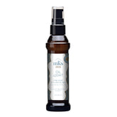 Earthly Body MKS Eco Oil Light Breeze bottle showing a weightless finish for fine hair.