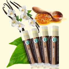 Earth's Daughter vanilla lip balm tubes close-up shows silky texture for smooth lips.