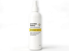 ECZEMA HONEY Antioxidant Body Oil bottle for daily moisturization after shower.