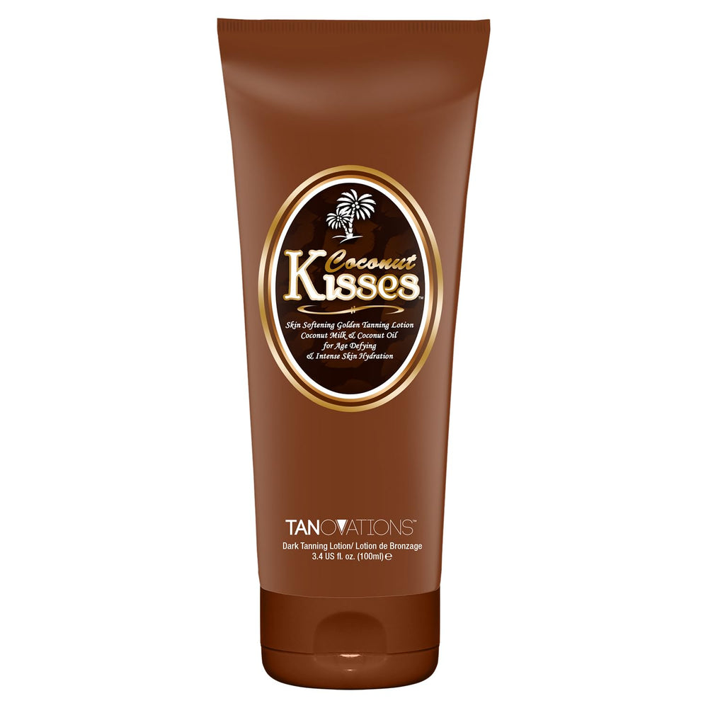 Ed Hardy Coconut Kisses Golden Tanning Lotion bottle on a sunny display for hydration.