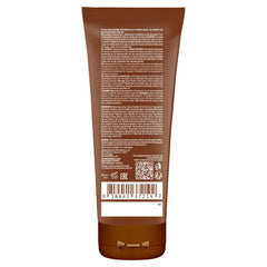 Ed Hardy Coconut Kisses Golden Tanning Lotion ingredient panel shows coconut oil and cocoa butter.
