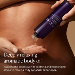 ELEMIS De-Stress Massage Oil bottle highlighting quick absorption and hydration.