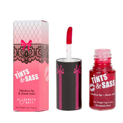 Elizabeth Mott Tints & Sass blush-like stain on cheeks for a buildable pink flush.