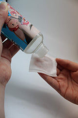Elizavecca Hell Pore Toner applied with cotton pad for refined pores.
