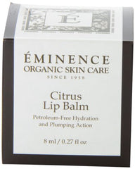 Applying Eminence Citrus Lip Balm for soothing, hydrated lips.