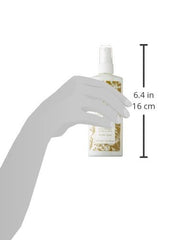Close-up of Eminence Neroli Age Corrective Hydrating Mist ingredients: neroli, coconut milk, green apple.