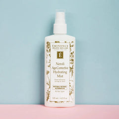 Eminence Neroli Hydrating Mist with neroli blossoms and a soothing aroma.