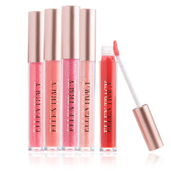 Enchante Ellen Tracy lip gloss set packaging highlights premium shimmer for all-day polish.