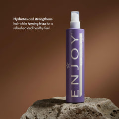 Enjoy Conditioning Spray smooths hair texture for detangling and moisture.