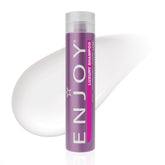 Enjoy Luxury Shampoo bottle demonstrates frizz control for thick hair.