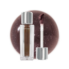 ENTROPY MAKE UP Tulle Lip Gloss bottle with lightweight veil and glow