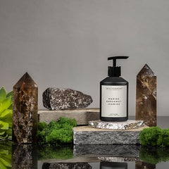 ENVIRONMENT RC Lotion bottle tilted view showing elegant design and long-lasting moisture