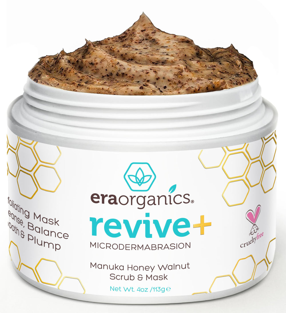Era Organics Manuka Honey Exfoliating Face Scrub bottle closeup, moisturizing microdermabrasion for glowing skin.