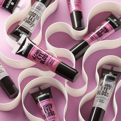 Essence Dewy EYE GLOSS on model eye shows versatile daytime to evening sparkle.