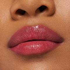 Product close-up highlights vegan, cruelty-free branding and no parabens.