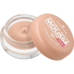 Spread on skin displays silky texture blending seamlessly for a natural base.