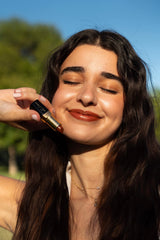 Essence Of Argan Chocolate Kiss shade swirl highlighting warm-toned lip color