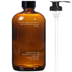 Essentially KateS Castor Oil glass amber bottle closeup protecting potency from light.
