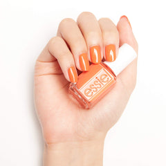 essie beach-day nails in tangerine reflecting sunny vibes for seaside weekends