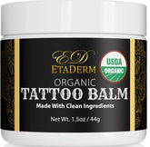ETADERM Tattoo Balm jar close-up showing creamy texture for hydration