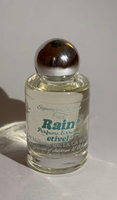 Etivel Rain perfume bottle closeup highlighting premium glass design for everyday wear