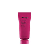 Eva NYC Repair Leave-In bottle pour demonstrates heat protection up to 450°F for styling.