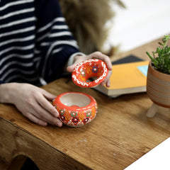EVANILIFE handmade ceramic jar with patterned colors adds cultural charm to shelves.