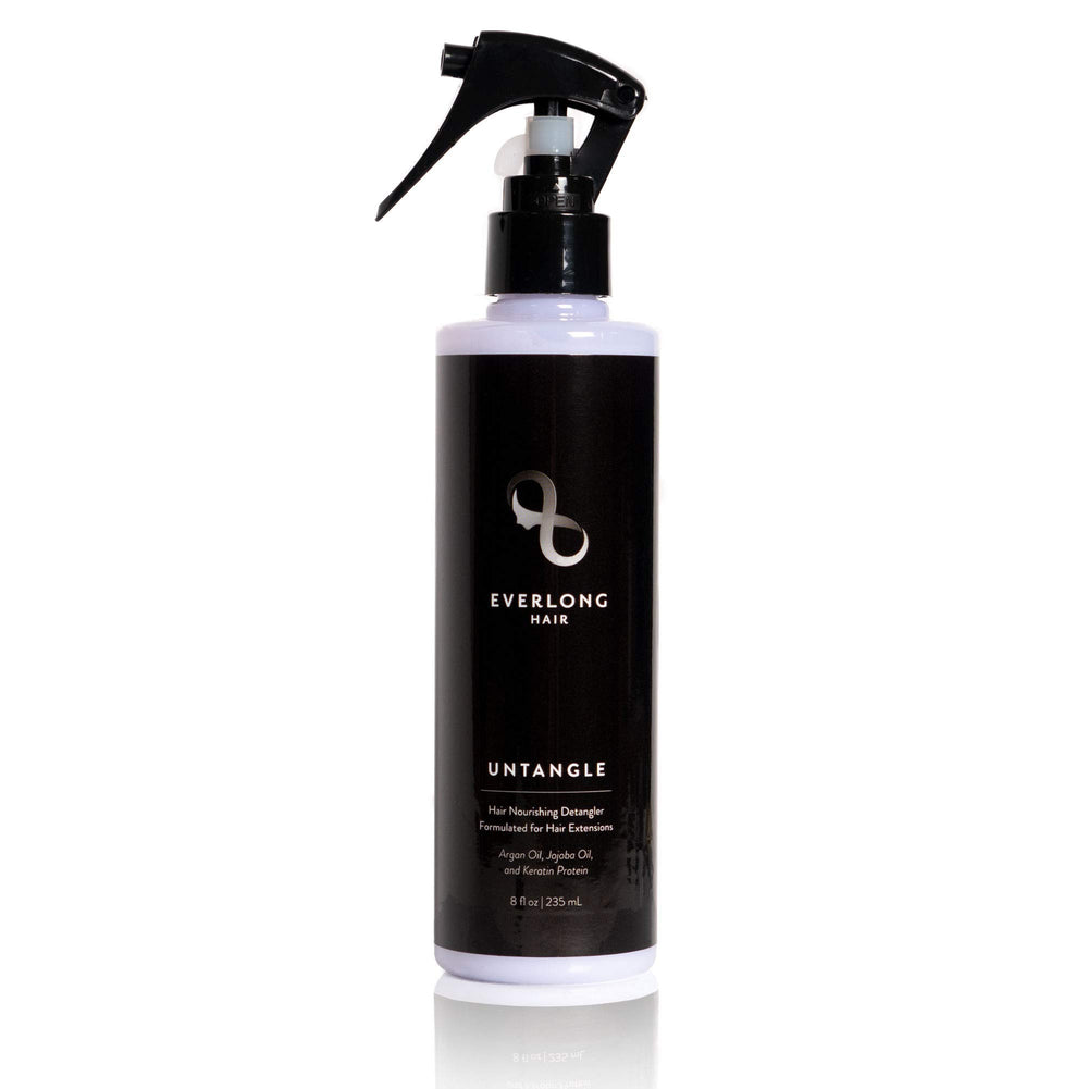 Everlong Untangle spray bottle detangles hair extensions.