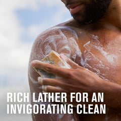 Every Man Jack soap bar wet in basin shows cleansing action and potential skin hydration.