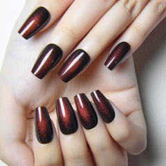 evpct reddish brown cat eye nails close-up with multidimensional shimmer for elegant look
