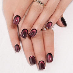 evpct wine red cat eye nails close-up, shimmering square tips add subtle glamour