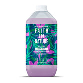Faith In Nature lavender and geranium body wash bottle on bathroom shelf for a gentle cleanse