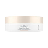 FARMASi Dr. C. Tuna cleansing balm texture close-up showing balm-to-oil transformation for gentle cleansing.