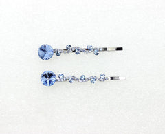 Elegant Faship accessory with light blue crystals enhances bridesmaids' hairstyles