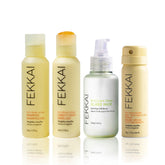 FEKKAI Brilliant Gloss Travel Bundle shampoo bottle demonstrates volumizing action for fuller, bouncier hair.