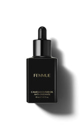 FEMMUE Camellia Elixir bottle pours for a hydrating skincare moment.