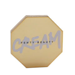 Fenty Beauty Cheeks Out Freestyle Cream Bronzer 04 Hunnie Glaze on cheek for sun-kissed glow