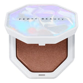 Fenty Beauty Demi'glow highlighter close-up of pearlescent pearls delivering a soft universal glow.
