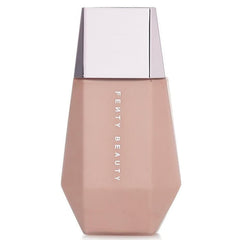 Fenty Beauty Eaze Drop'lit Pink Pearl Glow enhances radiance with a soft, all-over glow.
