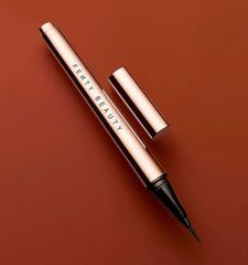 Fenty Beauty Flyliner close-up showing triangle grip for confident application and lasting wear