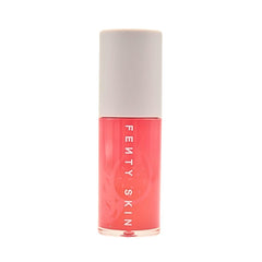 Close-up of clear lip oil texture providing moisture and nourishment