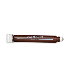 Finn & Co Black Sand travel-friendly rollerball ready for travel.