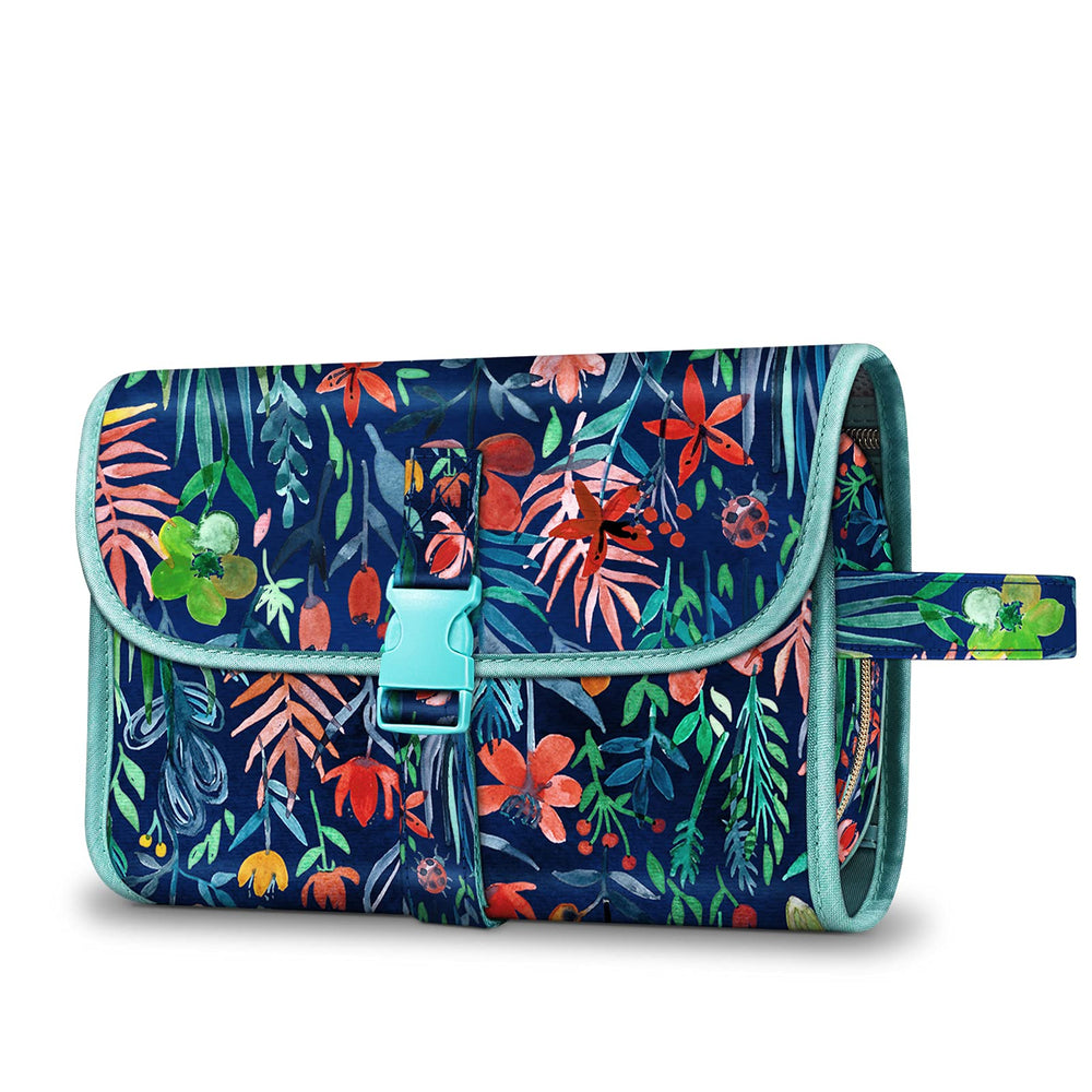 FINTIE Jungle Night toiletry bag rolled compact showing space-saving design