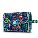 FINTIE Jungle Night toiletry bag rolled compact showing space-saving design