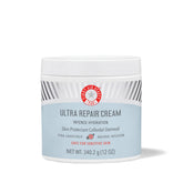 First Aid Beauty Ultra Repair Cream jar closeup showing rich hydration for dry skin relief