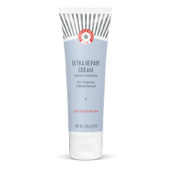 First Aid Beauty Ultra Repair Cream jar closeup showing rich, fast-absorbing hydration.