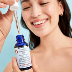 First Aid Beauty Ultra Repair dropper close-up emphasizing quick absorption.