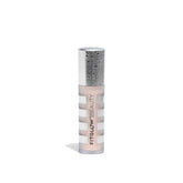Fitglow Conceal+ compact jar for full-coverage touch-ups on the go.