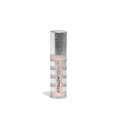 Fitglow Conceal+ compact jar for full-coverage touch-ups on the go.