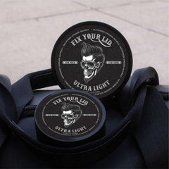 Fix Your Lid Ultra Light Pomade travel-size bottle ready for on-the-go styling